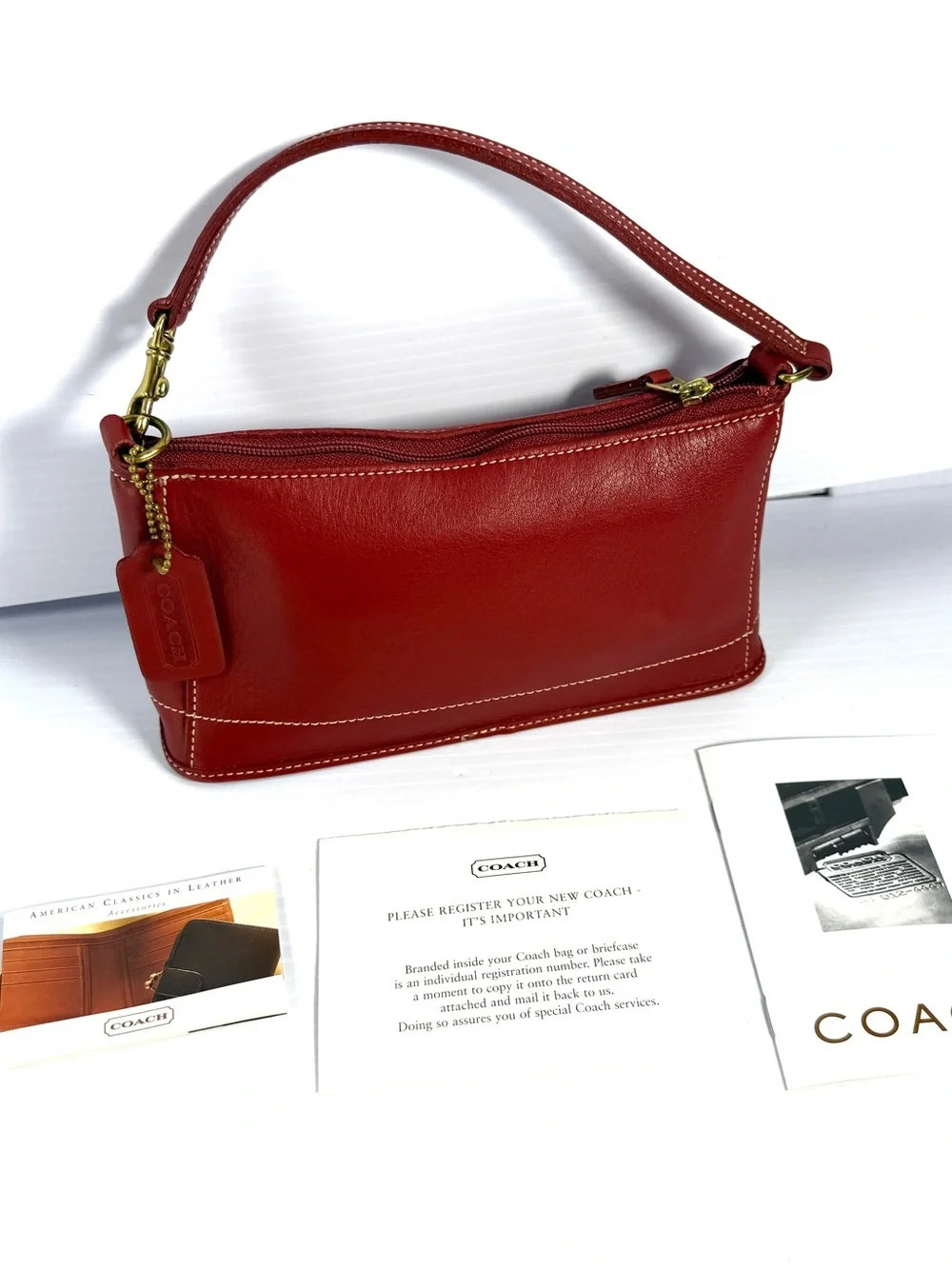 Coach compact red